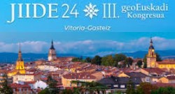 Cartel anunciador de las jornadas donde se ve el skyline de Vitoria en un día soleado y algunos datos de las jornadas